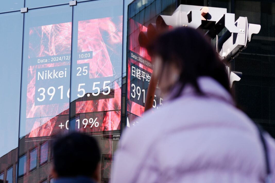 Stocks slide as US central bank signals slower pace of rate cuts