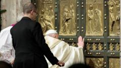 Pope Francis opens Holy Door at St Peter’s Basilica to kick off special jubilee year