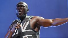 stormzy:-rapper-banned-from-driving-after-mobile-phone-use