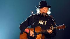 neil-young-reverses-glastonbury-festival-‘boycott’