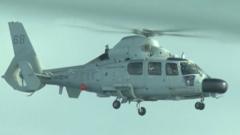 south-china-sea:-chinese-navy-helicopter-flies-close-to-philippine-plane