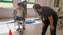 gaza-war:-injured-palestinian-boy-takes-first-steps-in-jordan