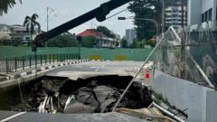 a-sinkhole-revives-debate-about-migrant-workers’-rights-in-singapore