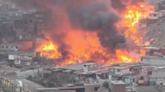 drone-captures-huge-fire-engulfing-homes-in-peru drone-captures-huge-fire-engulfing-homes-in-peru