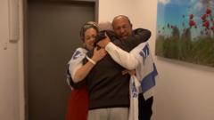 Watch: Emotional reunions as freed hostages return to Israel