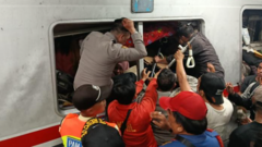 rescuers-try-to-free-survivors-trapped-inside-indonesia-train-after-fatal-crash rescuers-try-to-free-survivors-trapped-inside-indonesia-train-after-fatal-crash