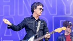 johnny-marr-to-auction-guitars-he-played-with-the-smiths-and-billie-eilish johnny-marr-to-auction-guitars-he-played-with-the-smiths-and-billie-eilish