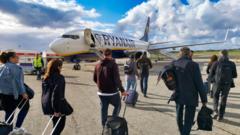 ryanair-says-it-will-reluctantly-not-charge-parents-to-sit-next-to-children ryanair-says-it-will-reluctantly-not-charge-parents-to-sit-next-to-children