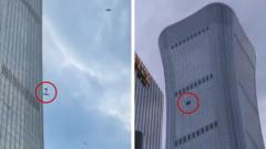 China: Debris falls after plane hits Beijing’s tallest building china:-debris-falls-after-plane-hits-beijing’s-tallest-building