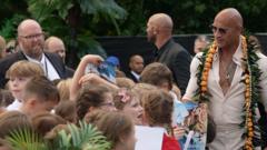 School trip surprise as students meet The Rock at Moana event school-trip-surprise-as-students-meet-the-rock-at-moana-event