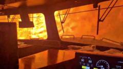 Dramatic video shows wildfire surround freight train in Canada dramatic-video-shows-wildfire-surround-freight-train-in-canada