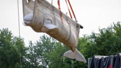 Beluga whales from closed Canada park arrive in new US homes beluga-whales-from-closed-canada-park-arrive-in-new-us-homes
