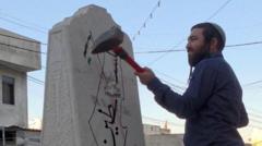Far-right Israeli lawmaker damages Palestinian memorial with sledgehammer far-right-israeli-lawmaker-damages-palestinian-memorial-with-sledgehammer