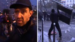 Fireworks and tear gas as protesters and riot police clash in Paris fireworks-and-tear-gas-as-protesters-and-riot-police-clash-in-paris