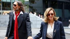 Russell Brand’s wife tells his rape trial he is ‘kind and a wonderful father’ russell-brand’s-wife-tells-his-rape-trial-he-is-‘kind-and-a-wonderful-father’
